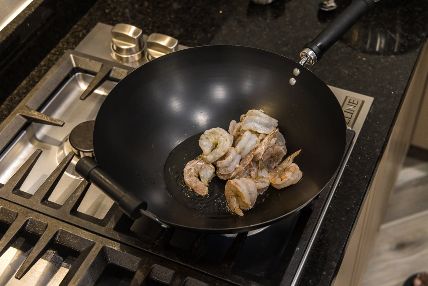 shrimp in a skillet with oil