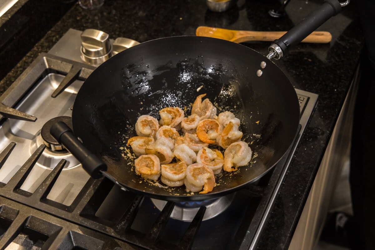 sauteeing shrimp in a skillet