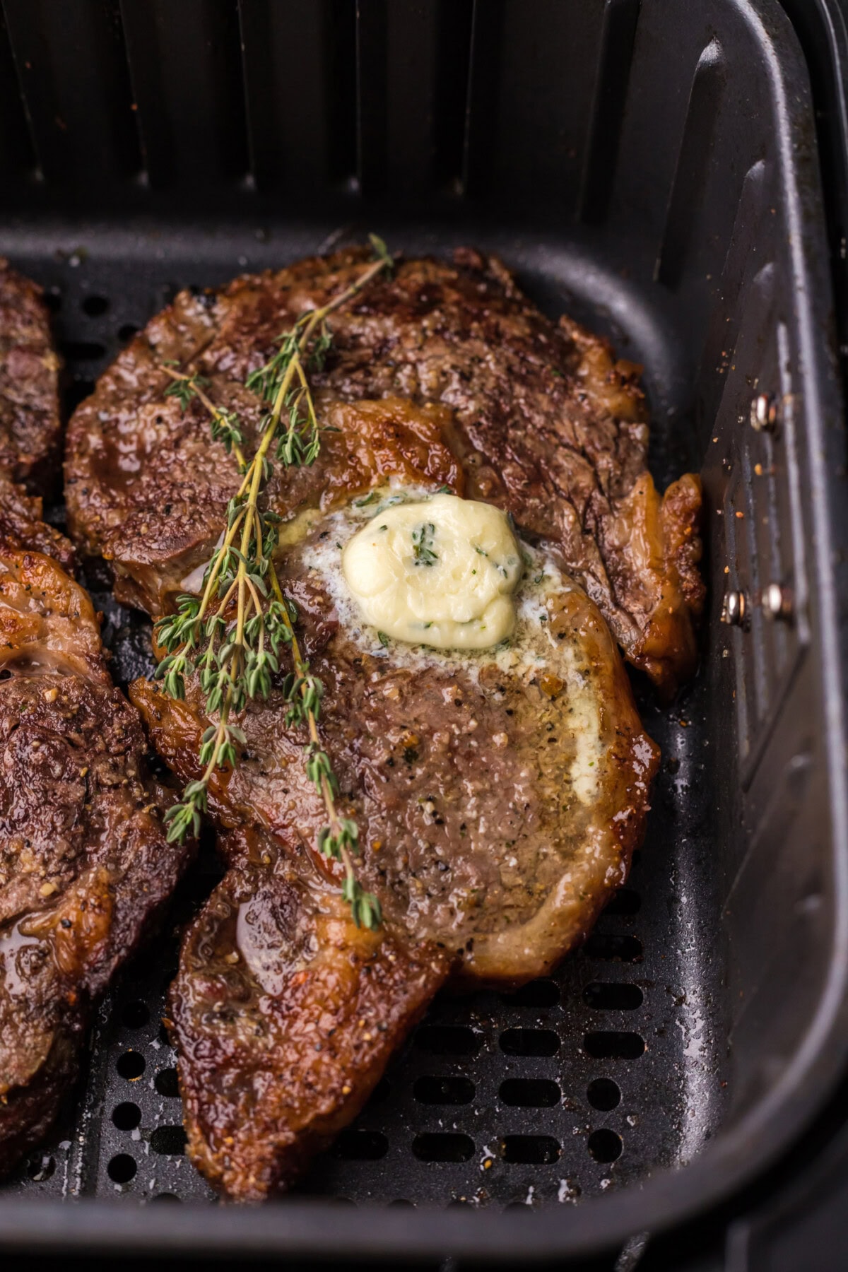 Close up photo of Air Fryer Steak in an air fryer