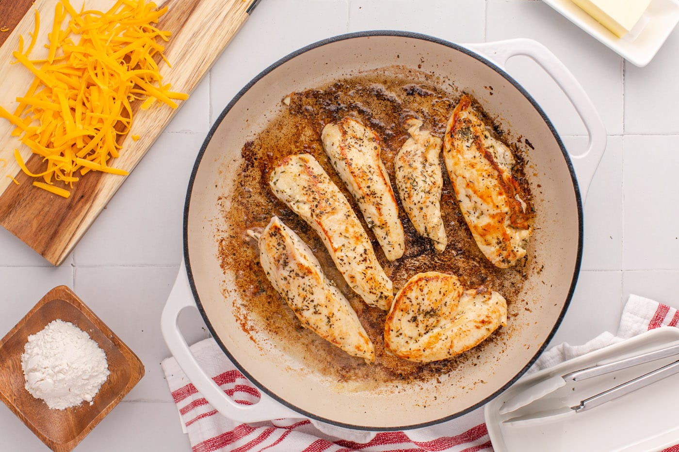 pan seared chicken breasts in a skillet
