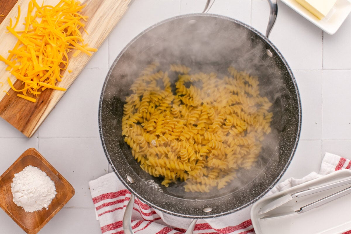 cooking rotini noodles in a pot