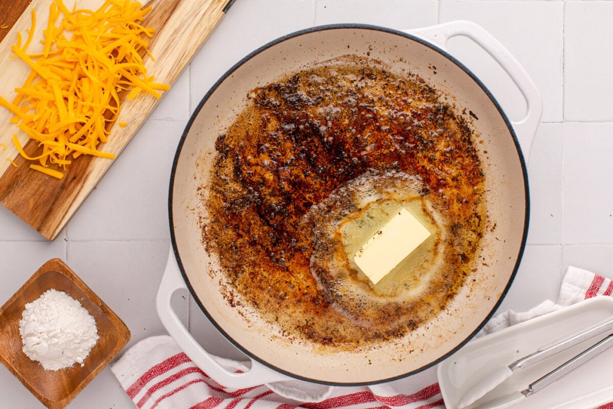butter added to pan with chicken drippings