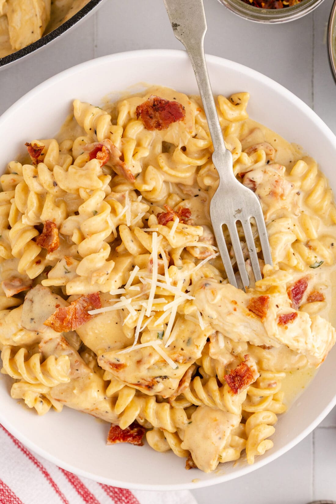 Bowl of Bacon Chicken Ranch Pasta with a fork in it