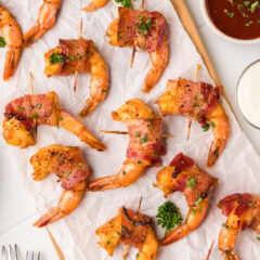 Close up photo of Bacon Wrapped Shrimp on a serving platter