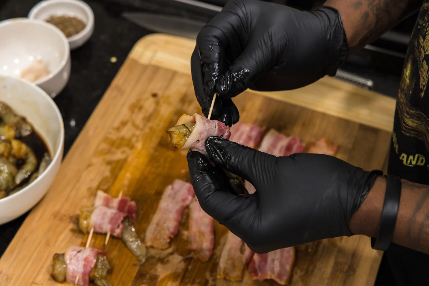 securing bacon wrapped shrimp with a toothpick