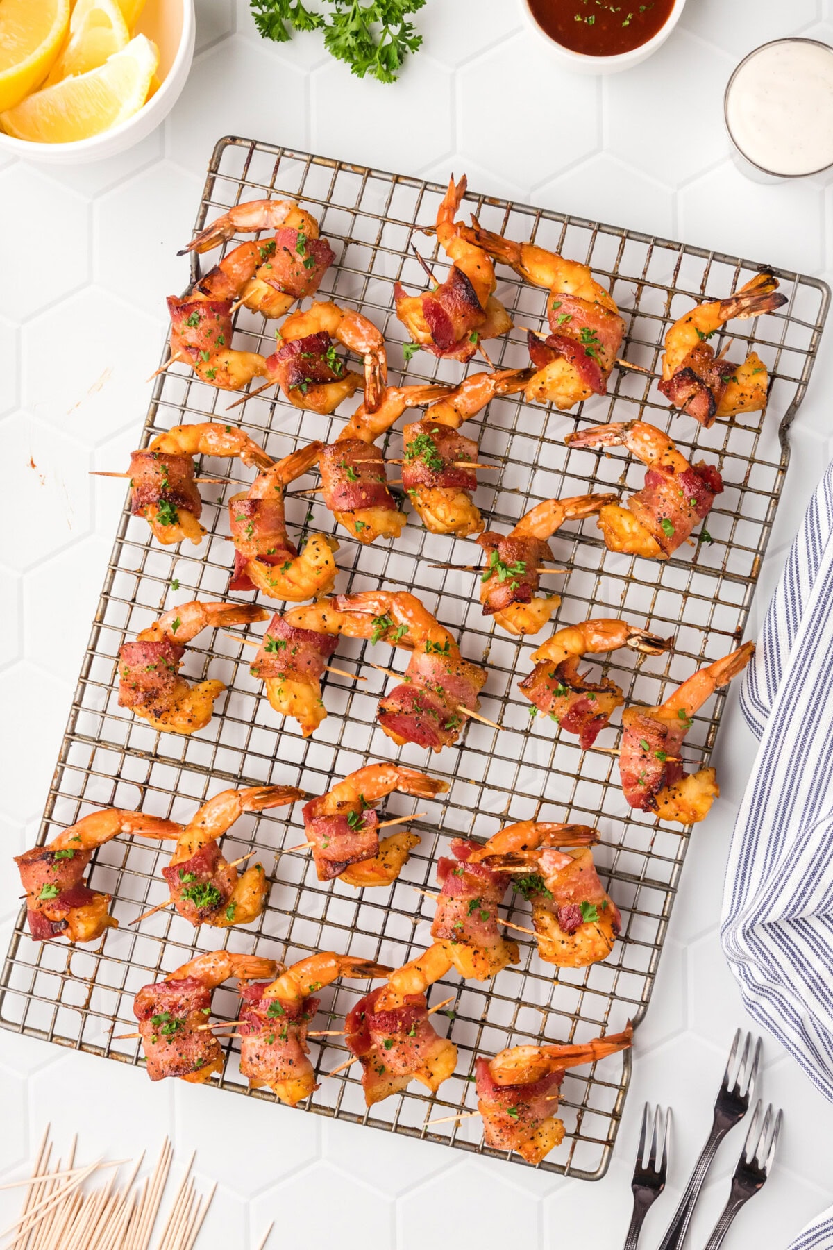 Bacon Wrapped Shrimp resting on a wire rack