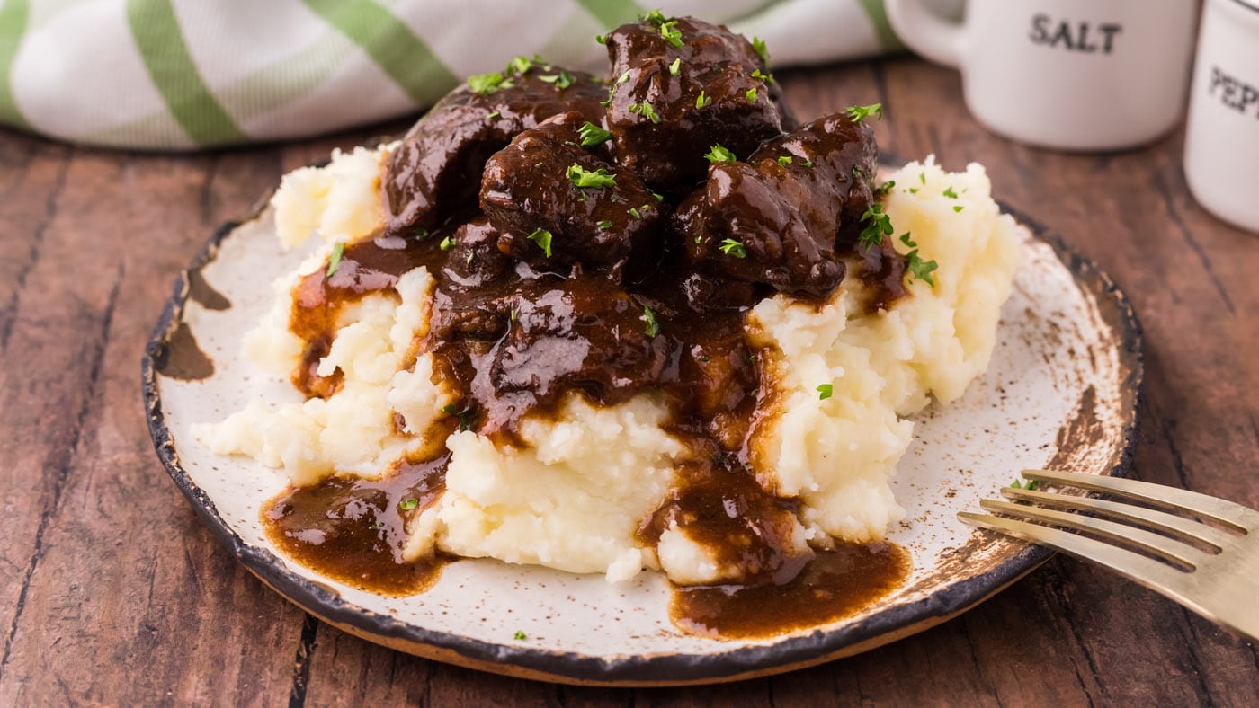 Tender beef smothered in a flavorful brown gravy, this beef tips and gravy recipe can't get much bet