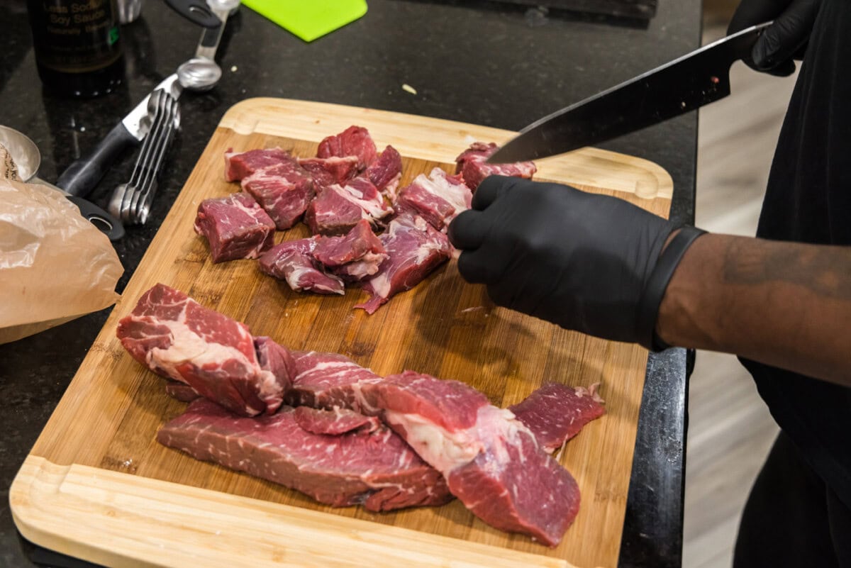 slicing chuck roast into cubes