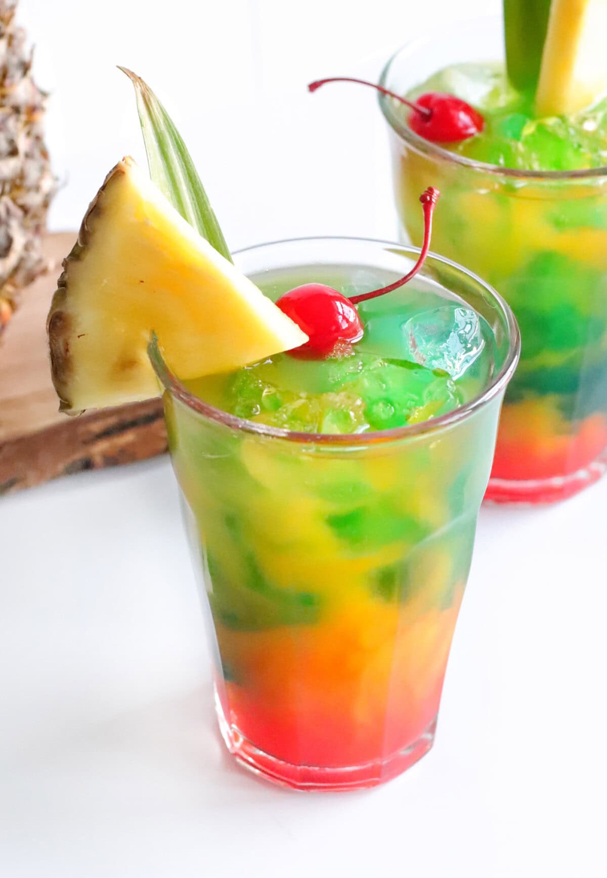 Blue Hawaiian Mai Tai garnished with a pineapple wedge and cherry