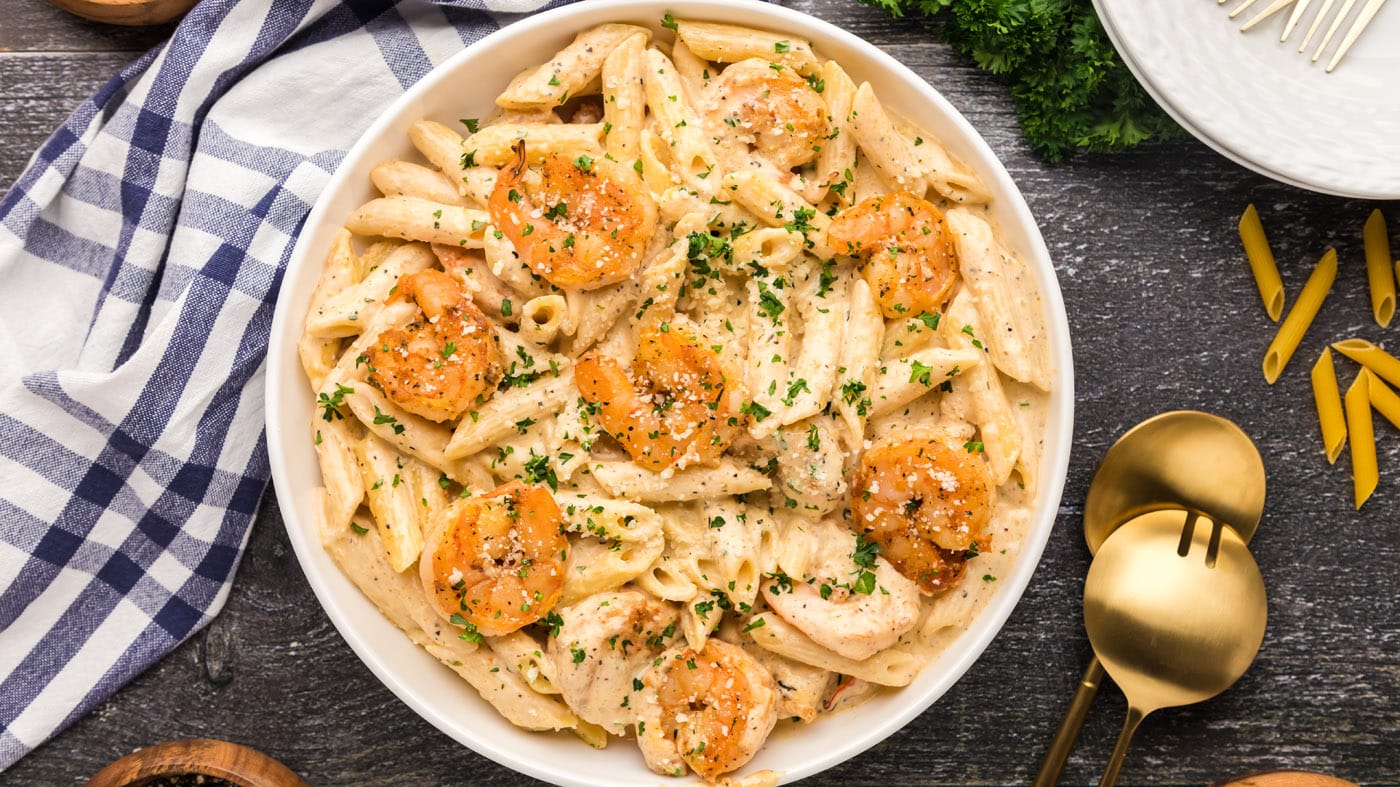 Each bite of this cajun shrimp pasta brings forth the comforting warmth of bold cajun seasoning, cre