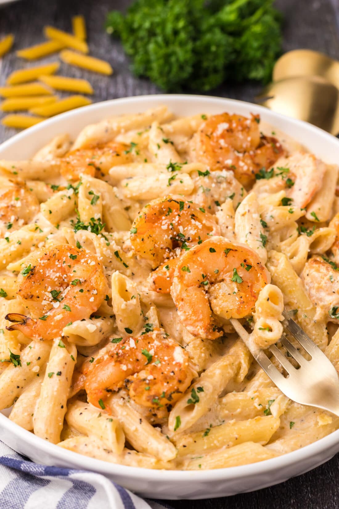 Close up photo of Cajun Shrimp Pasta with a fork