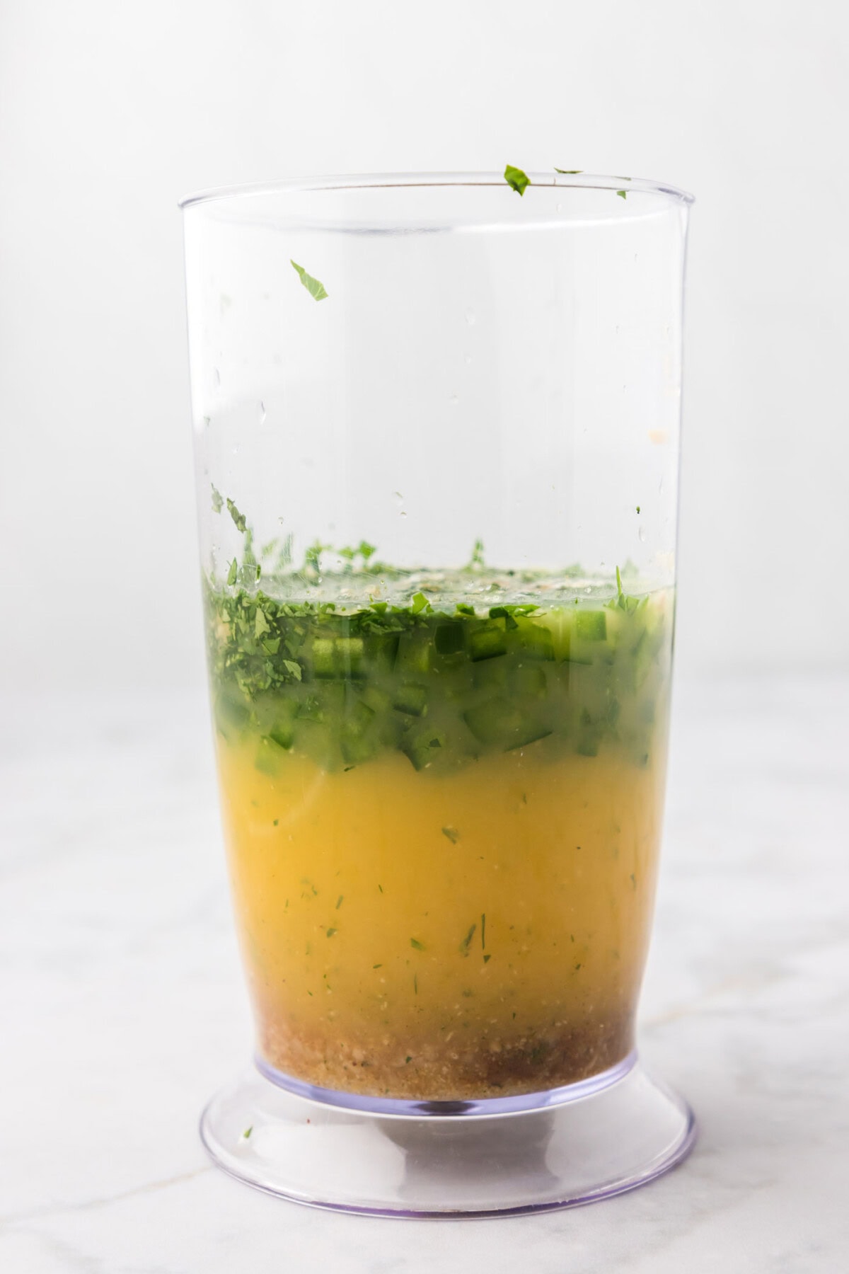 marinade ingredients in an immersion blender