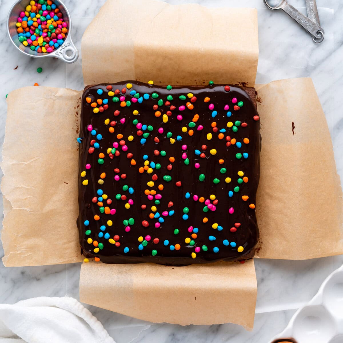 cosmic brownie sprinkles on top of ganache