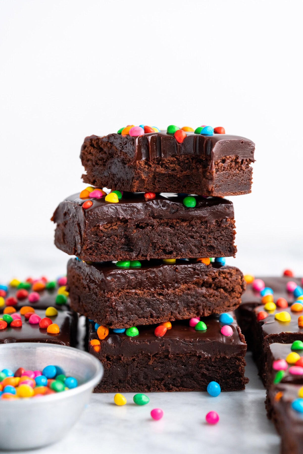 Stack of Cosmic Brownies with a kite taken out of the top brownie