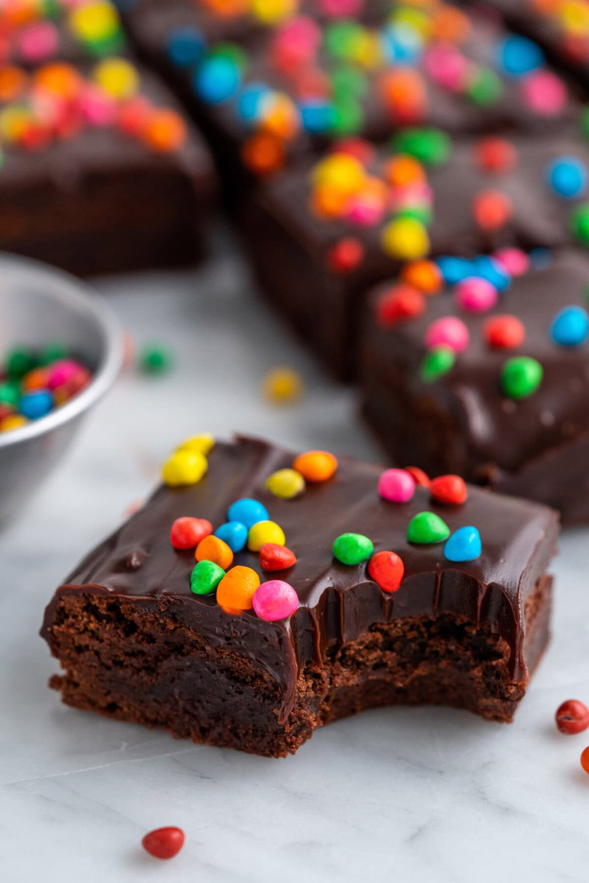 Close up photo of a Cosmic Brownies with a bite taken out