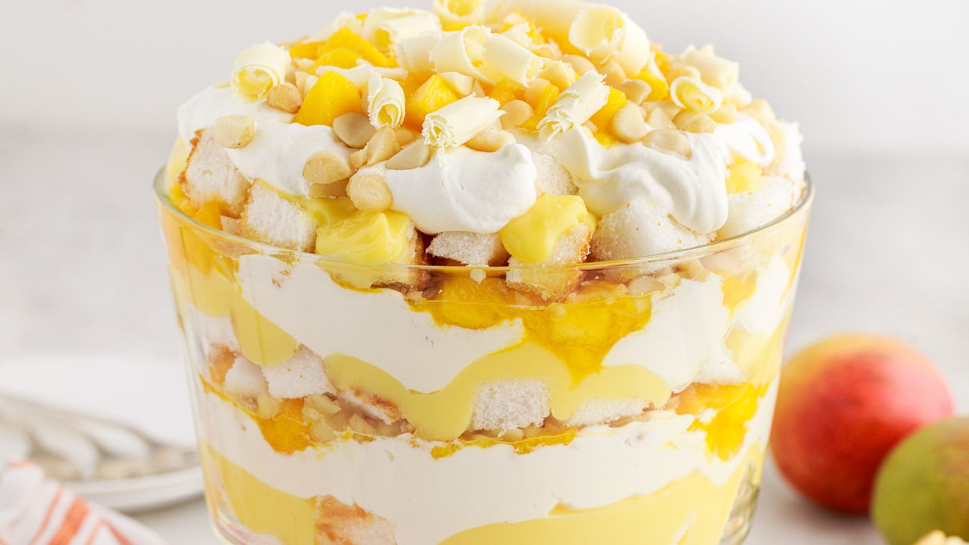 This trifle is light and airy piled with angel food cake, vanilla pudding, whipped cream, mango, and