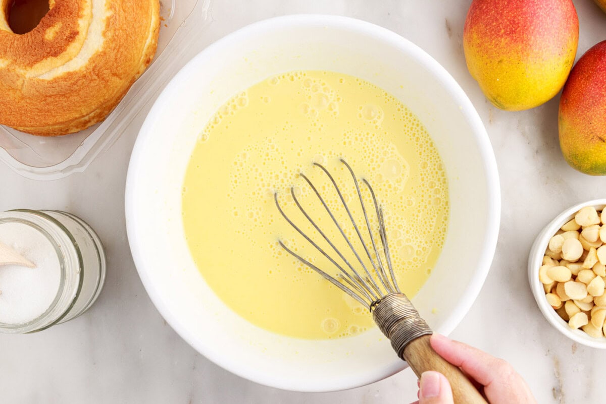 whisking instant vanilla pudding in a bowl