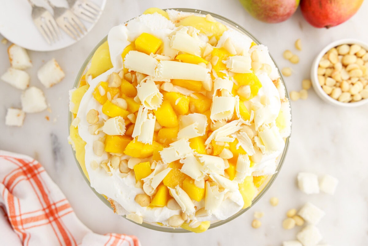 white chocolate shavings over mango trifle