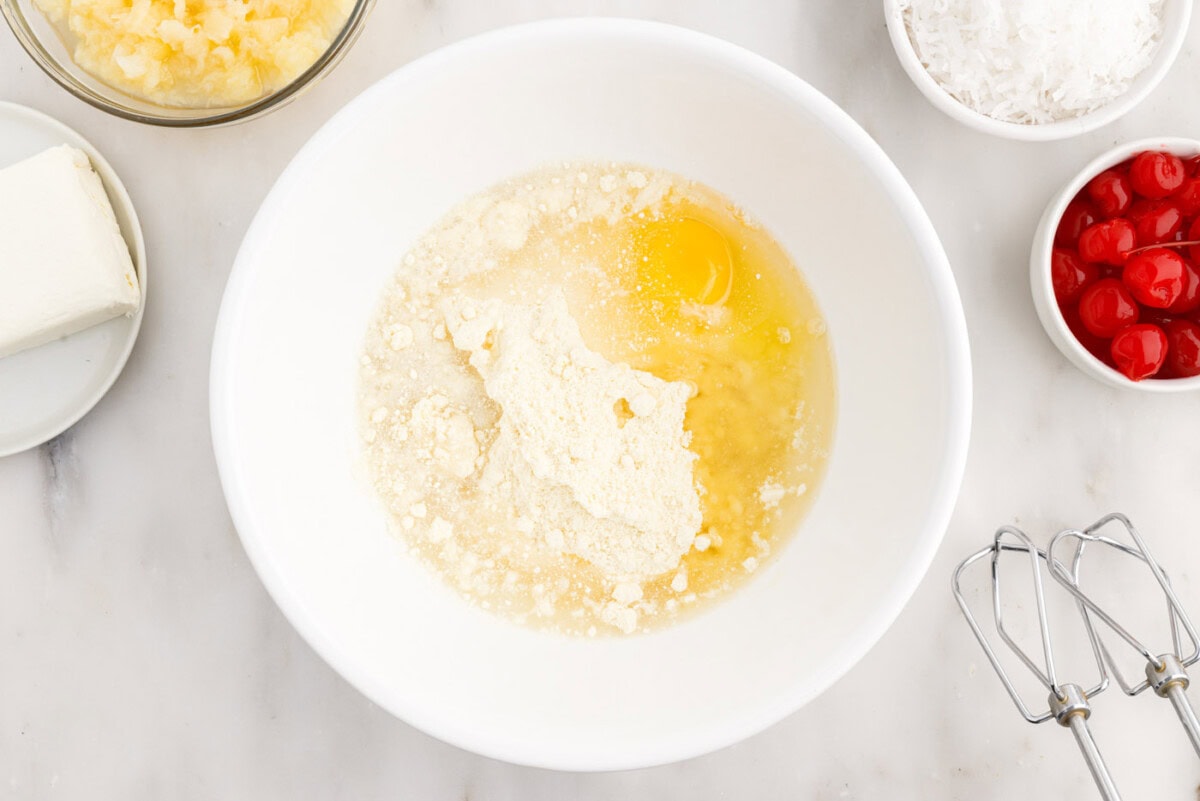 cake mix, eggs, water, and oil in a bowl