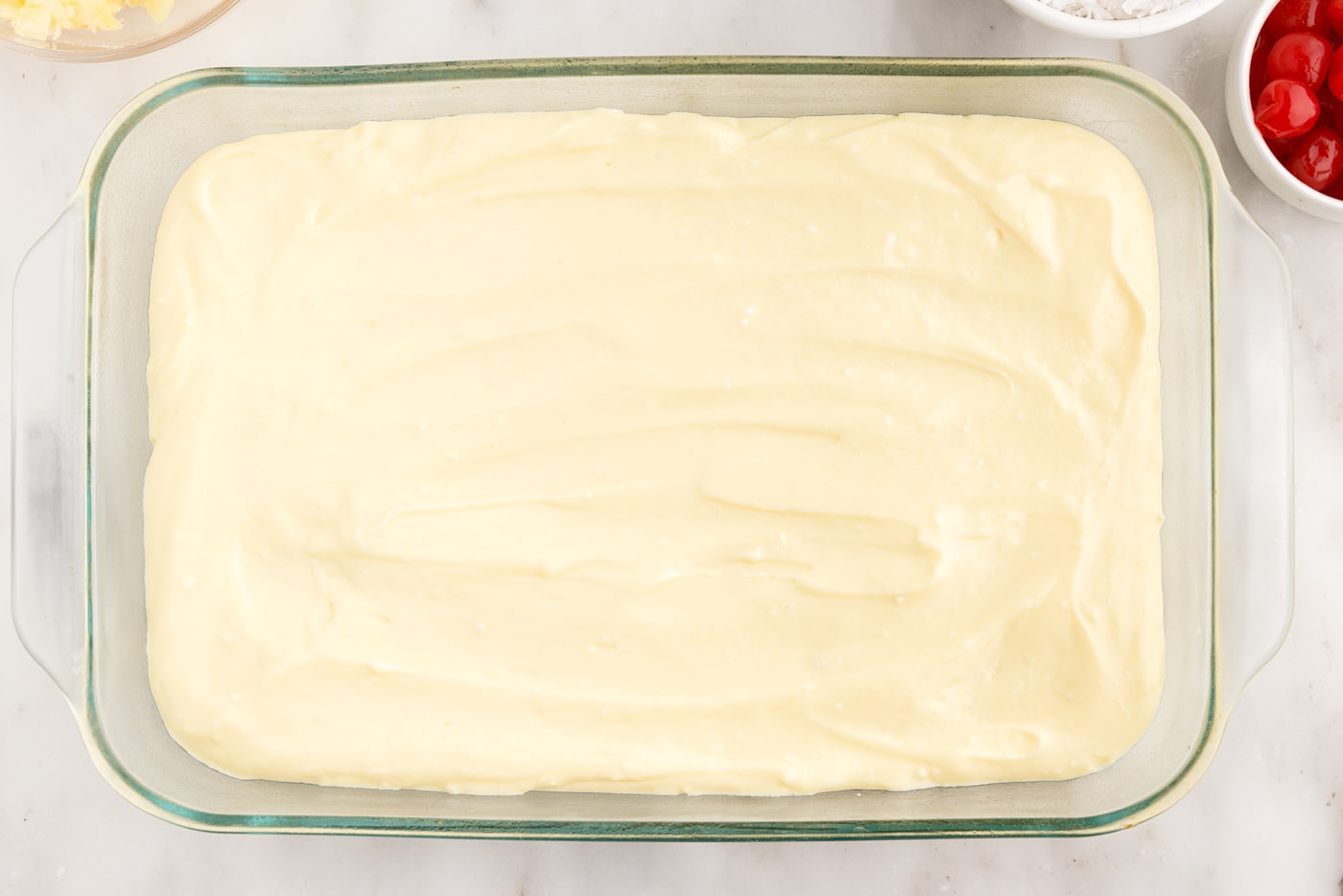 layer of cream cheese pudding over cake