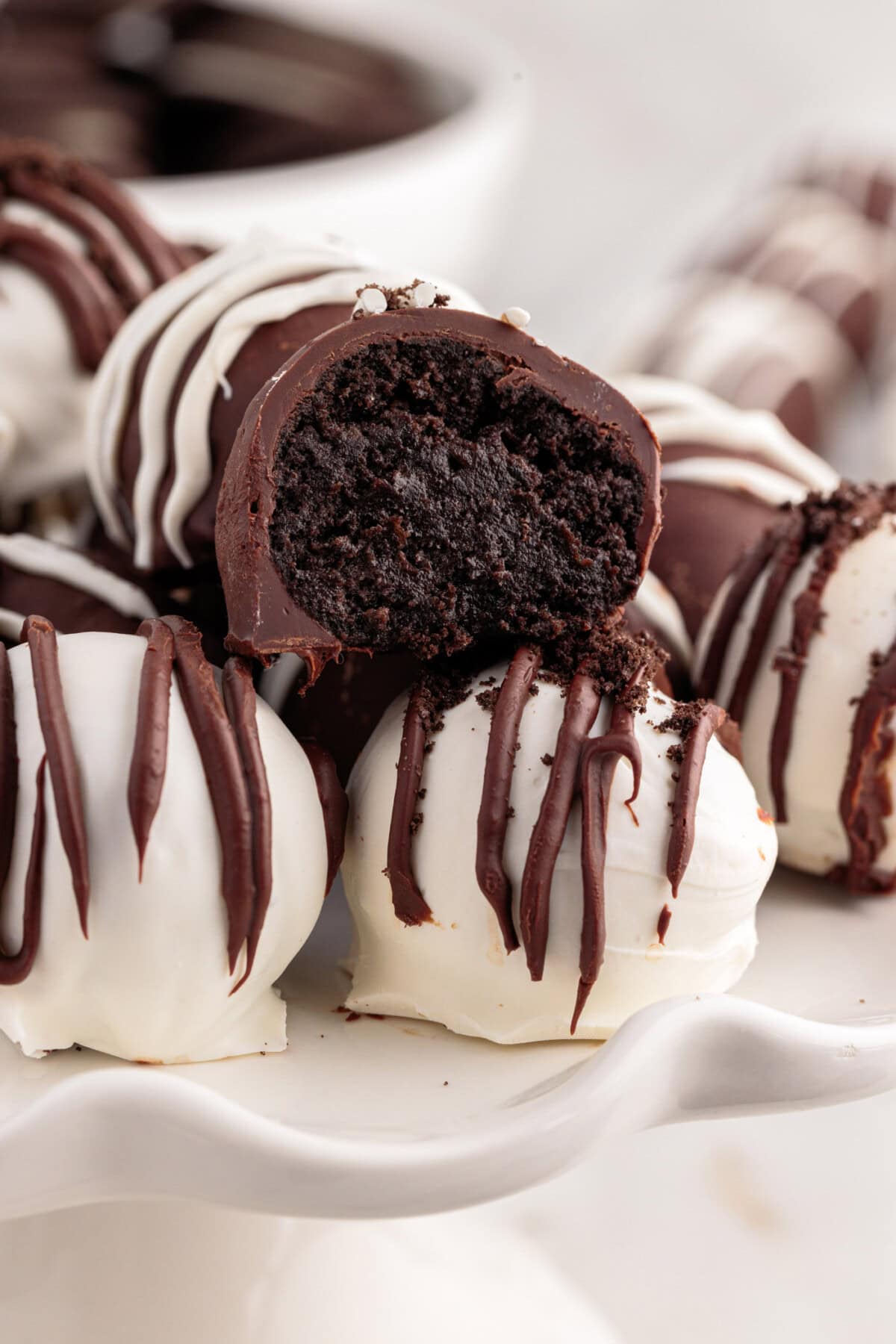 Close up photo of an Oreo Truffle with a bite out of it
