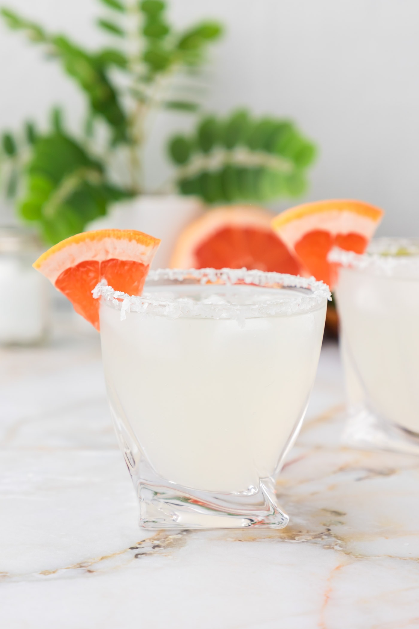 paloma cocktail garnished with grapefruit wedge