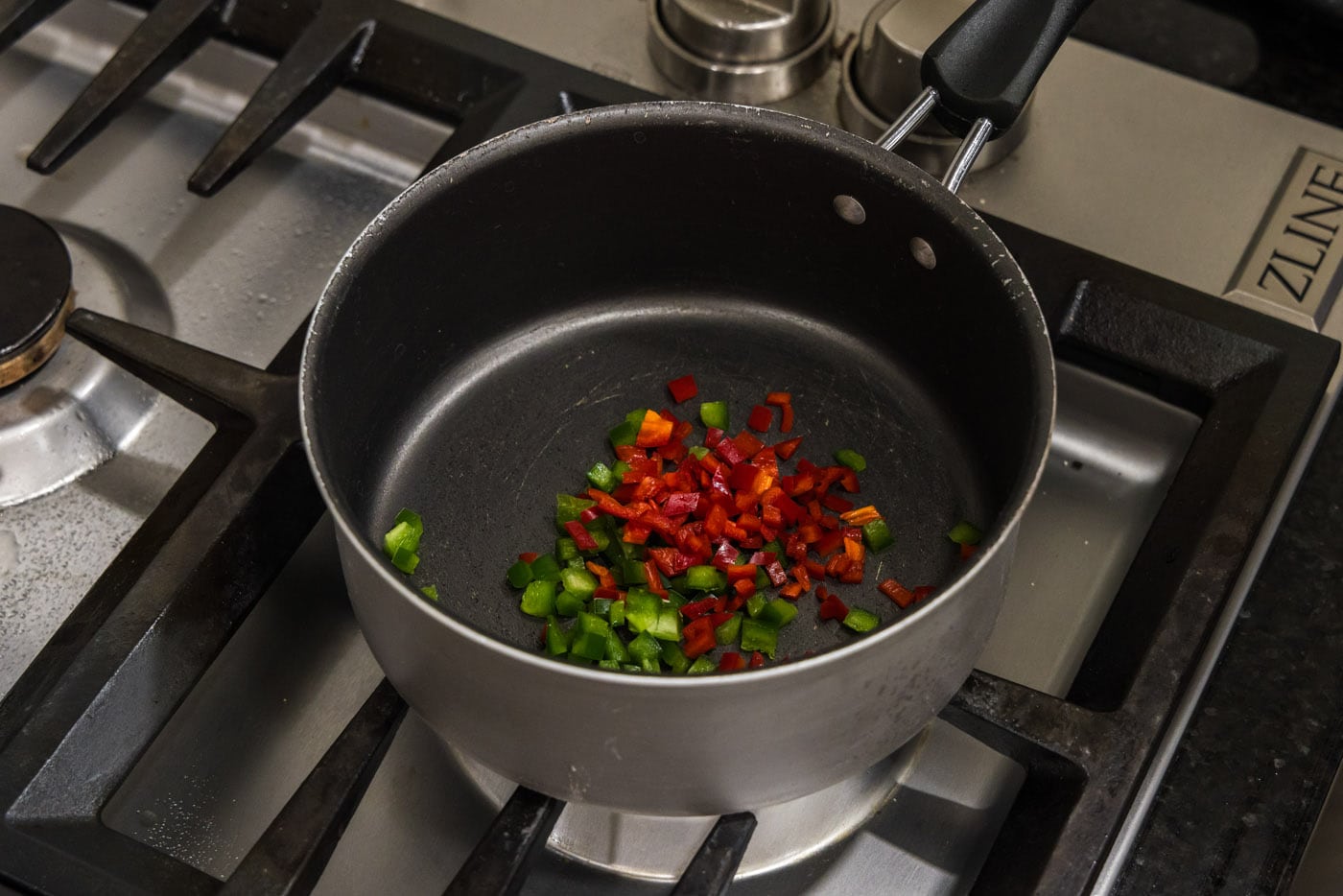red chiles and jalapenos in a saucepan