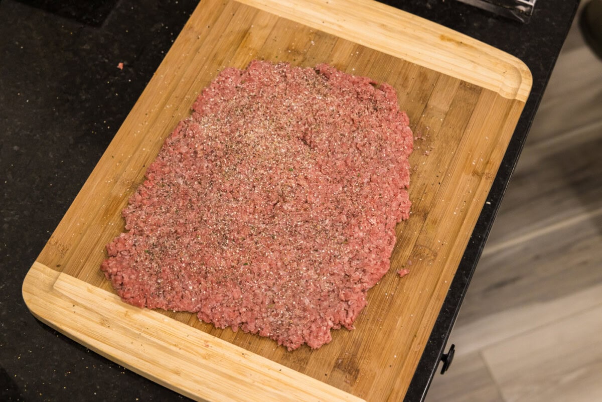 flattened ground beef with seasonings