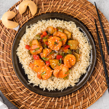 Plate of Sweet and Sour Shrimp served over rice