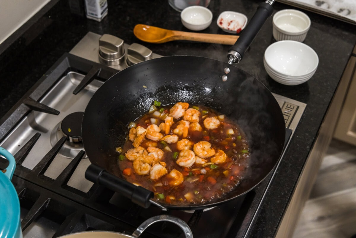 shrimp in skillet with sweet and sour sauce