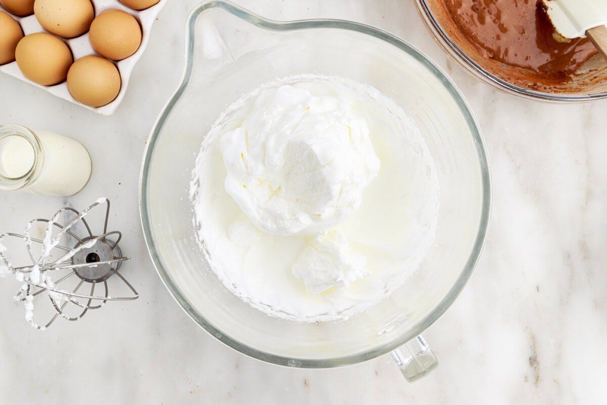 whipped egg whites in a mixer bowl