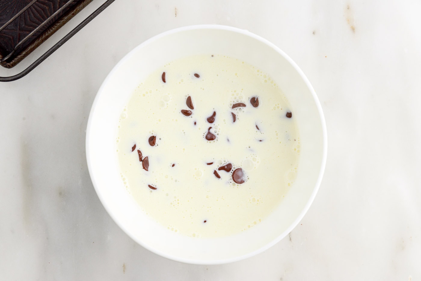 cream and chocolate chips in a bowl