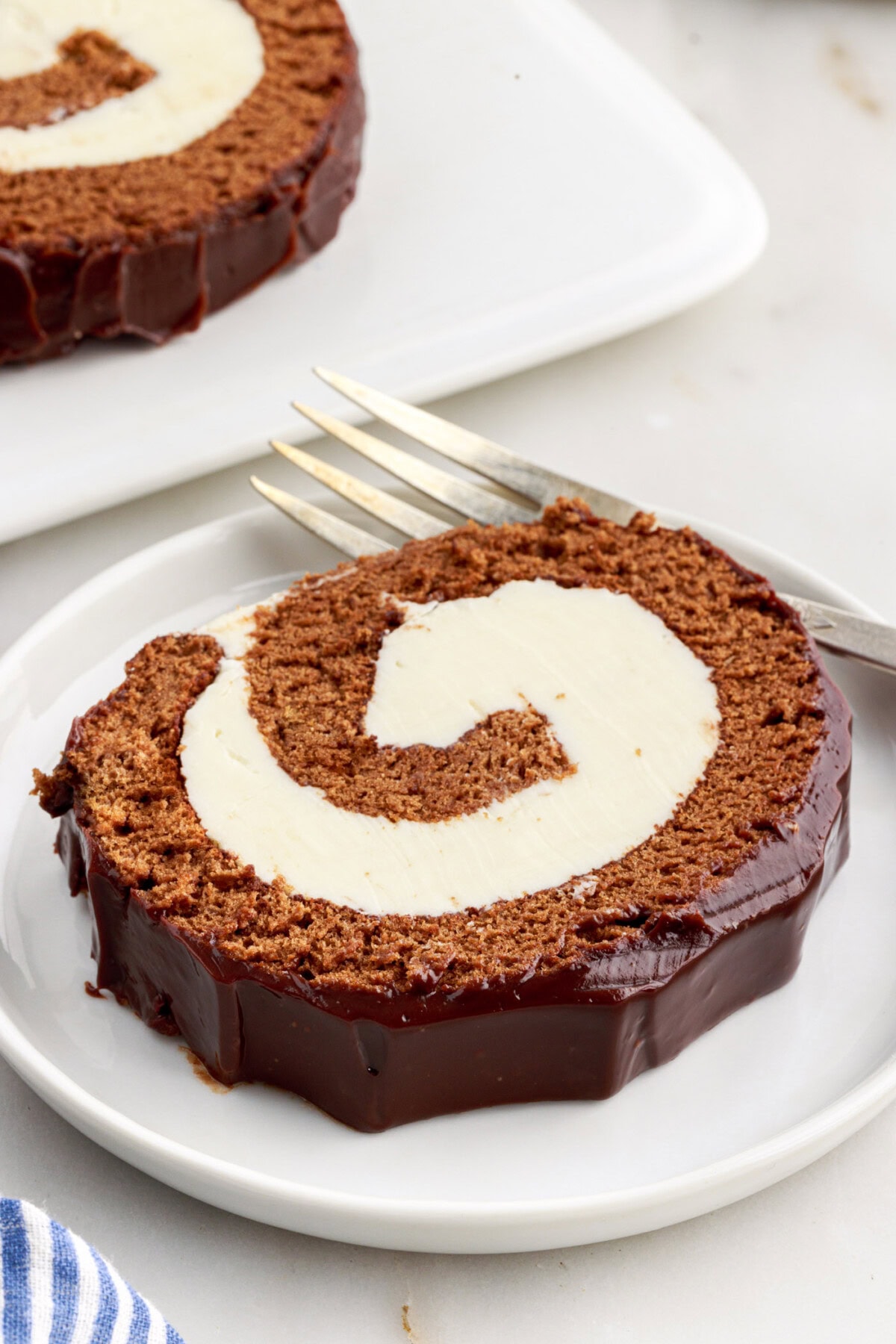 Slice of Swiss Roll on a plate