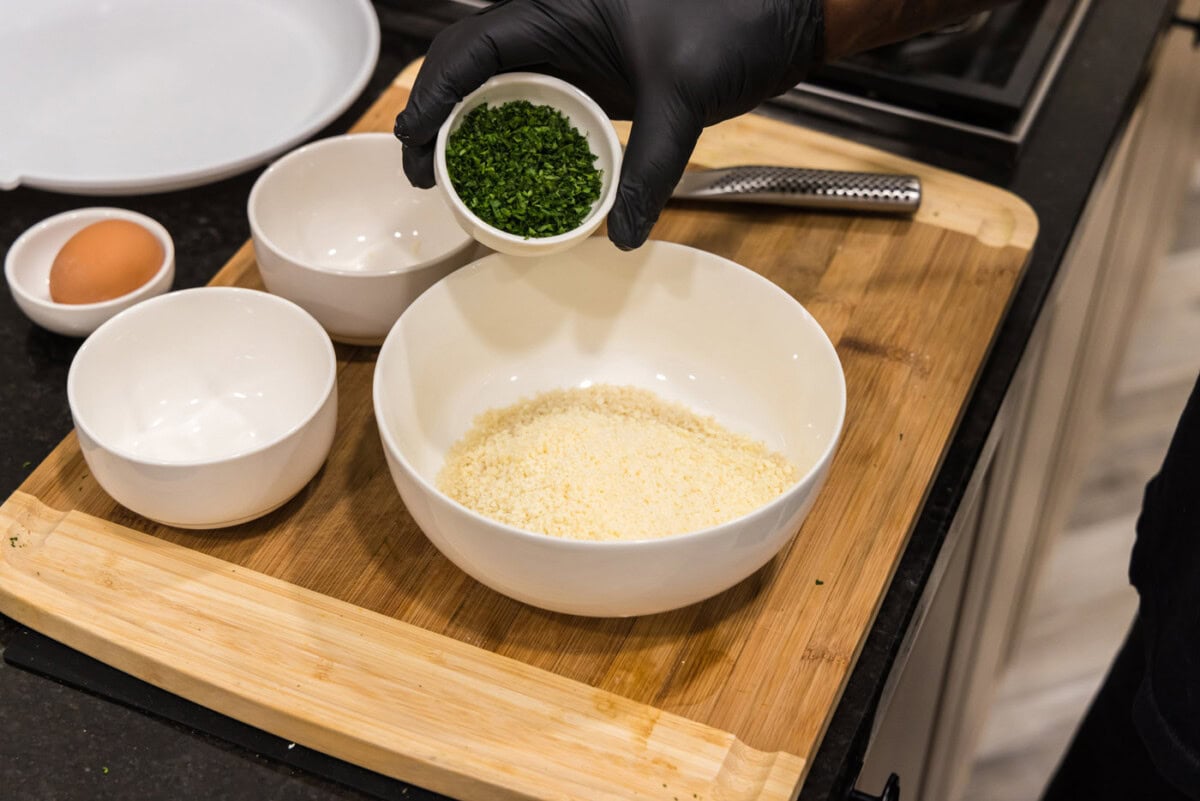 breadcrumbs, parsley, and parmesan cheese in a bowl
