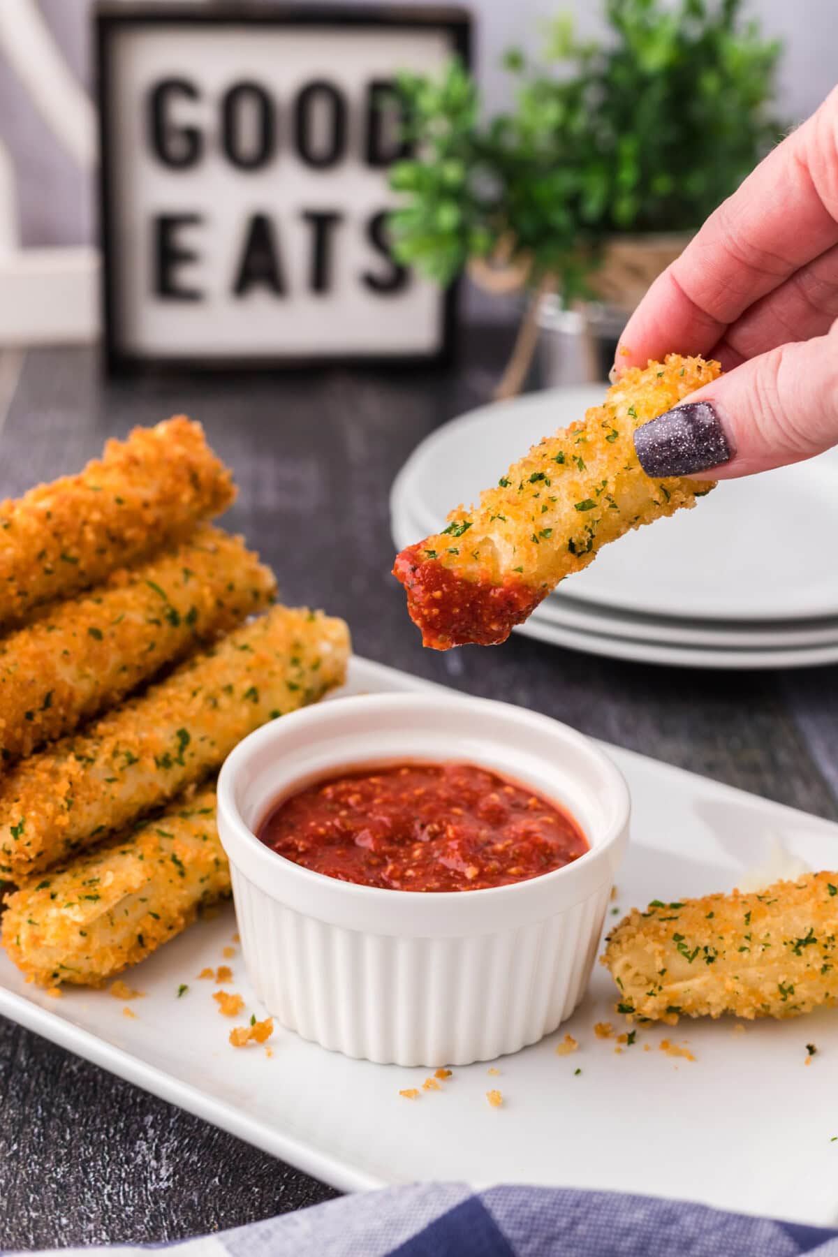 Wonton Cheese Stick dipped in marinara sauce