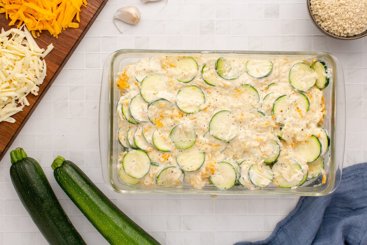 mayo and cheese zucchini mixture in a baking dish