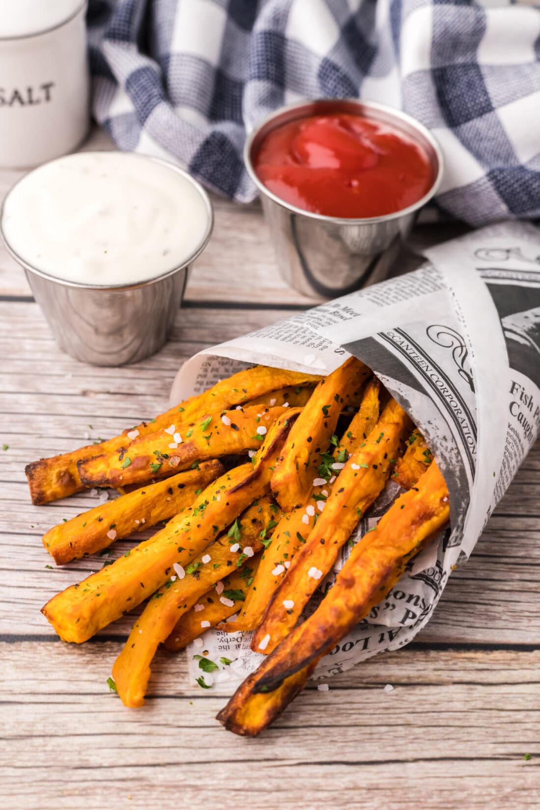 Air Fryer Sweet Potato Fries wrapped in parchment paper