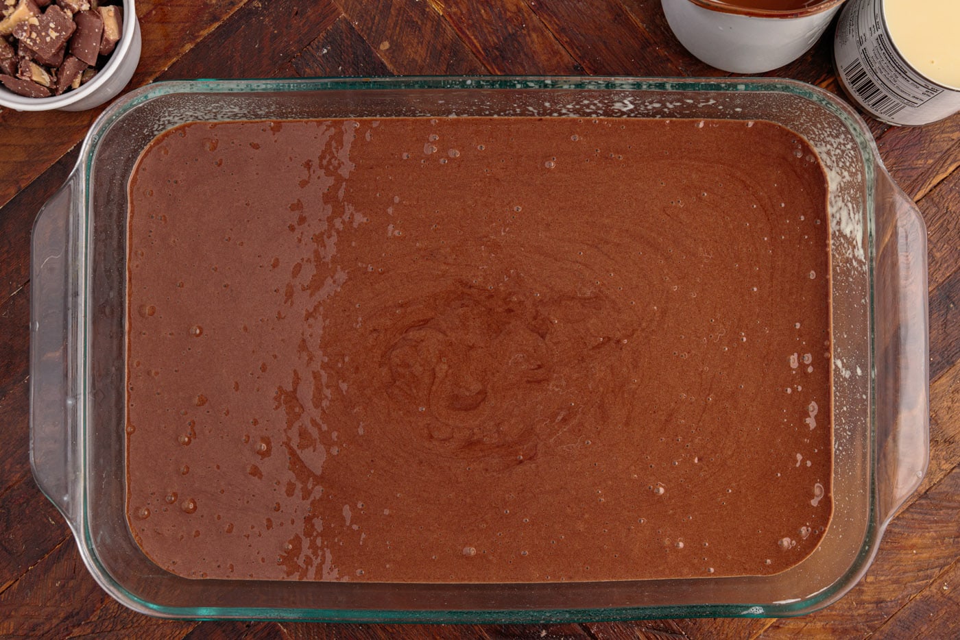 devils food cake batter in a 13x9 dish