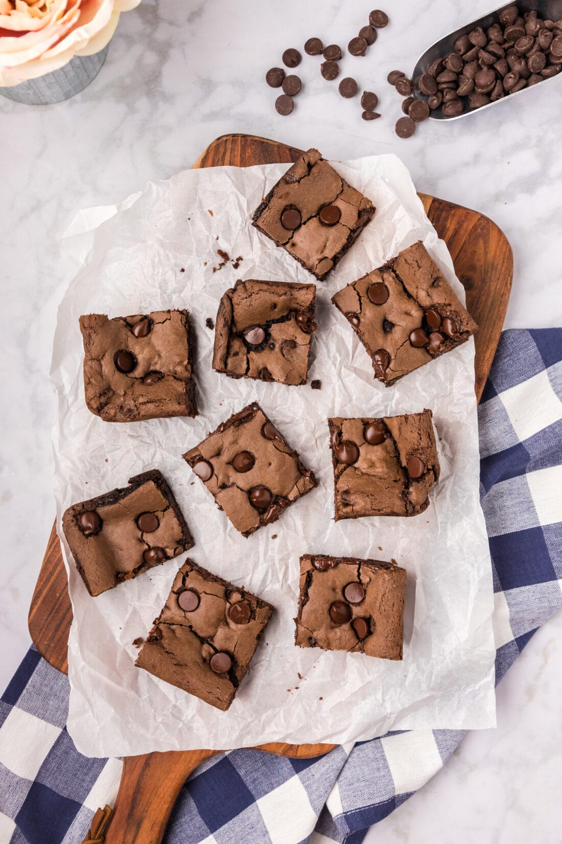 Cake Mix Brownies cut into squares on parchment paper