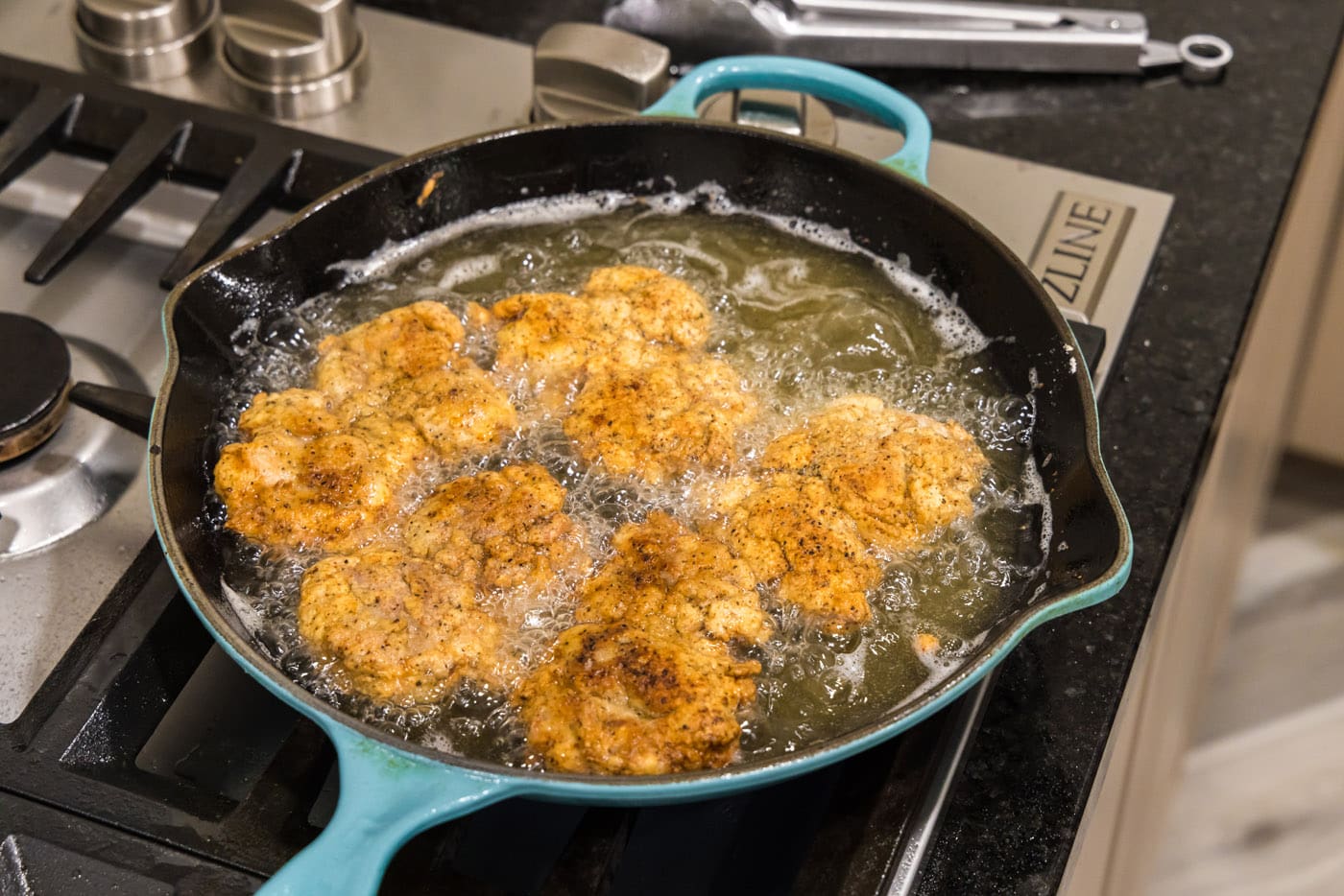 fried chicken thighs in a skillet