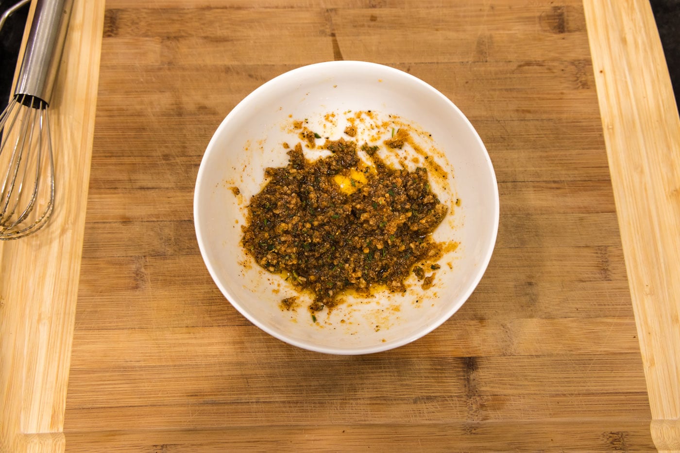 seasonings mixed with olive oil in a bowl