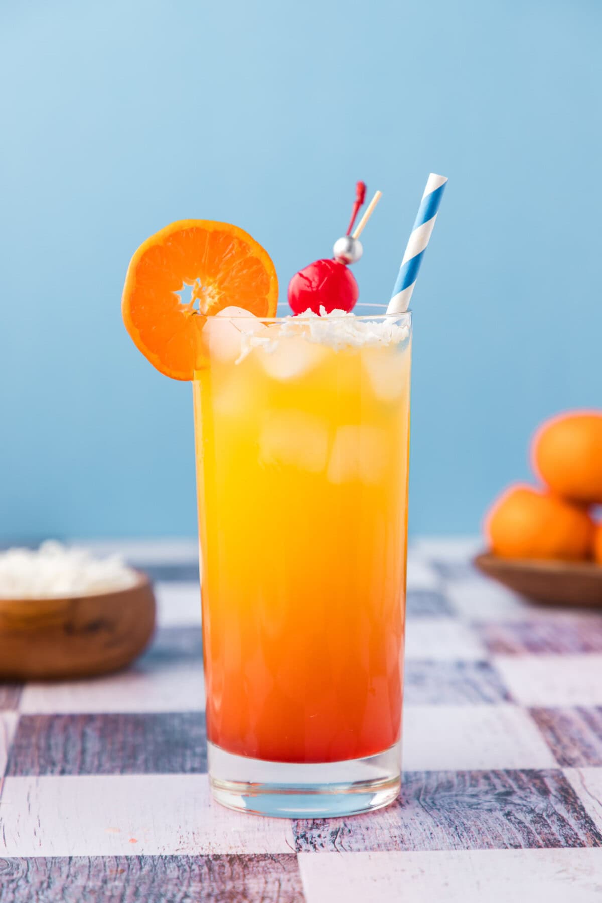 Malibu Sunrise garnished with an orange wheel and cherry
