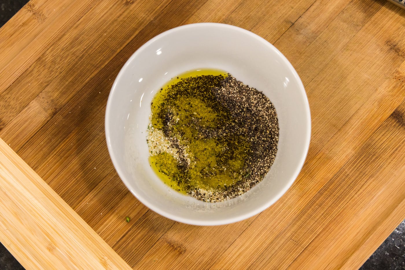 olive oil, garlic salt, and pepper in a bowl