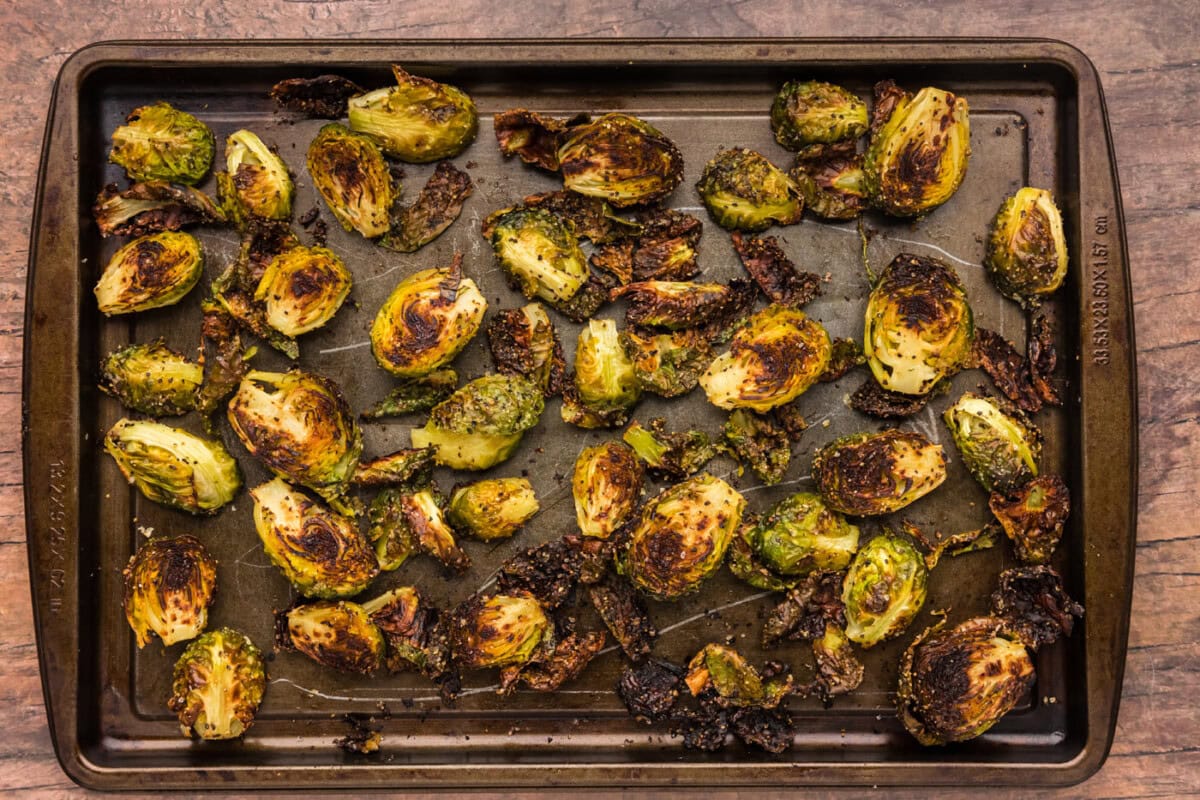 finished roasted brussels sprouts on a baking sheet