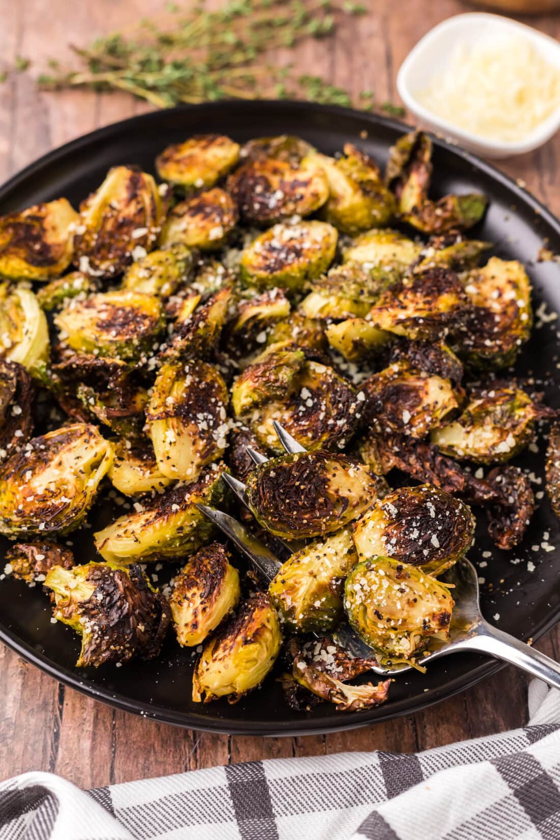 Plate of Roasted Brussel Sprouts with a fork