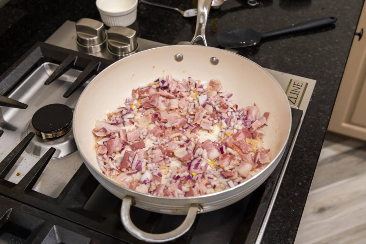 shallots, garlic, and bacon in skillet