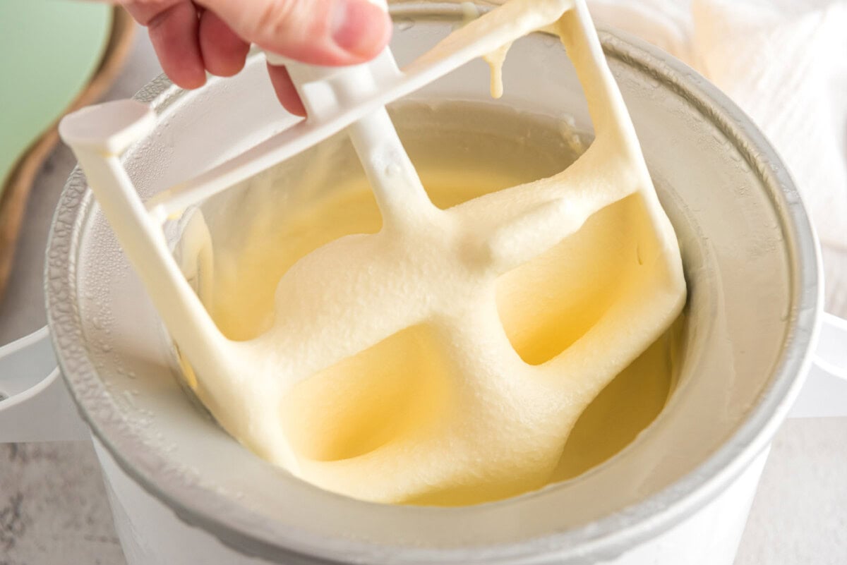 Ice cream maker paddle being lifted out of the ice cream maker to show texture