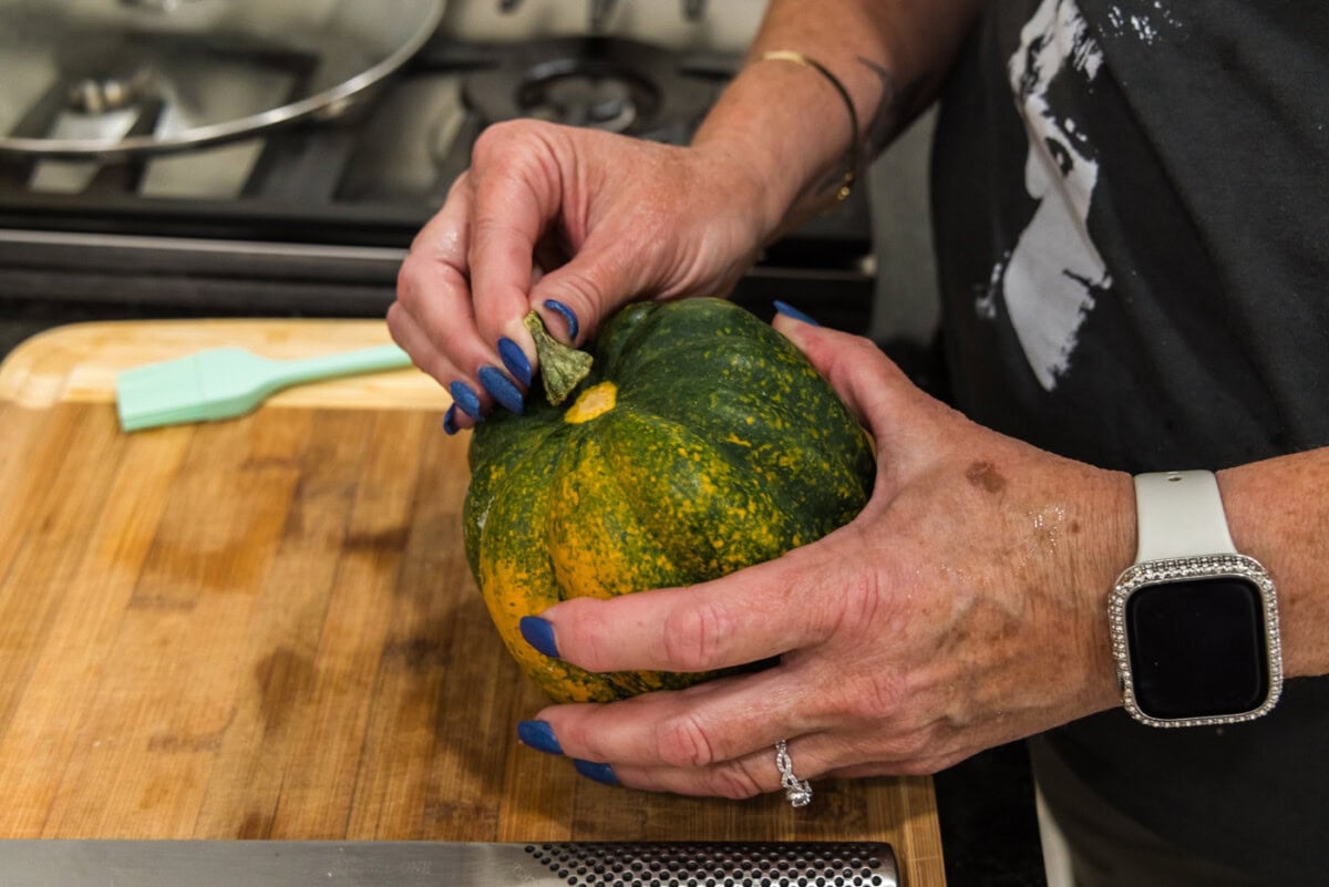 removing the stem from an acorn squash