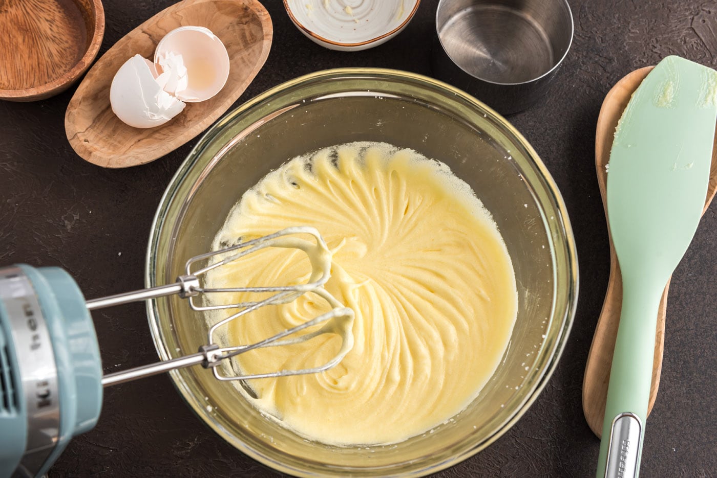 butter, eggs, and sugar mixture in a bowl