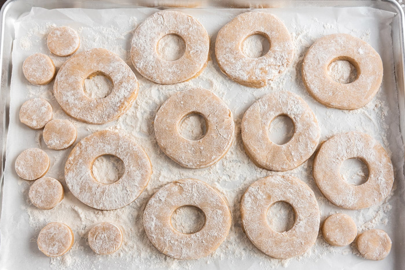donut shapes on a baking sheet
